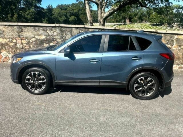 Синий Мазда СХ-5, объемом двигателя 2.5 л и пробегом 72 тыс. км за 9300 $, фото 2 на Automoto.ua