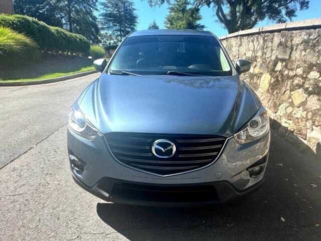 Синий Мазда СХ-5, объемом двигателя 2.5 л и пробегом 72 тыс. км за 9300 $, фото 1 на Automoto.ua
