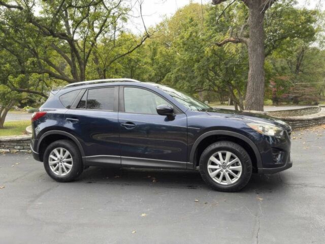 Синий Мазда СХ-5, объемом двигателя 2.5 л и пробегом 79 тыс. км за 10300 $, фото 7 на Automoto.ua