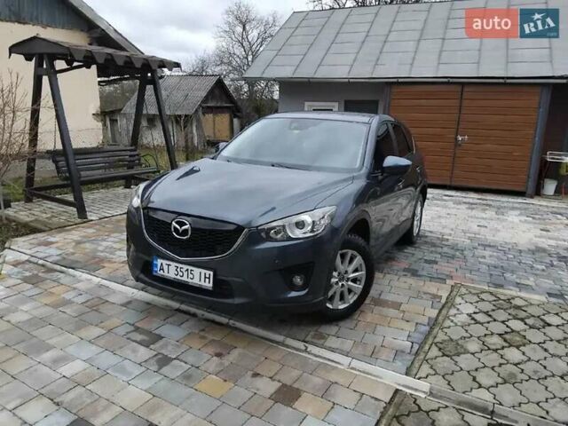 Синий Мазда СХ-5, объемом двигателя 2.19 л и пробегом 260 тыс. км за 12500 $, фото 29 на Automoto.ua