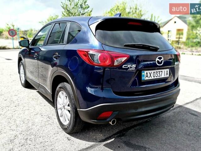 Синий Мазда СХ-5, объемом двигателя 2 л и пробегом 175 тыс. км за 11800 $, фото 26 на Automoto.ua