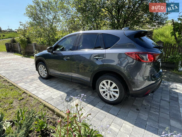 Синий Мазда СХ-5, объемом двигателя 2.19 л и пробегом 260 тыс. км за 12500 $, фото 5 на Automoto.ua