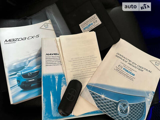 Мазда СХ-5 2012 в Кельменцах на Automoto.ua Синий Мазда СХ-5, объемом двигателя 2.2 л и пробегом 220 тыс. км за 13750 $, фото 8 на Automoto.ua
