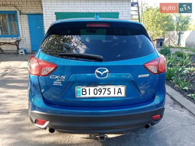 Синій Мазда СХ-5, об'ємом двигуна 2 л та пробігом 210 тис. км за 13900 $, фото 1 на Automoto.ua