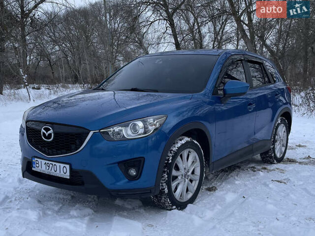 Синий Мазда СХ-5, объемом двигателя 2.2 л и пробегом 212 тыс. км за 13000 $, фото 2 на Automoto.ua