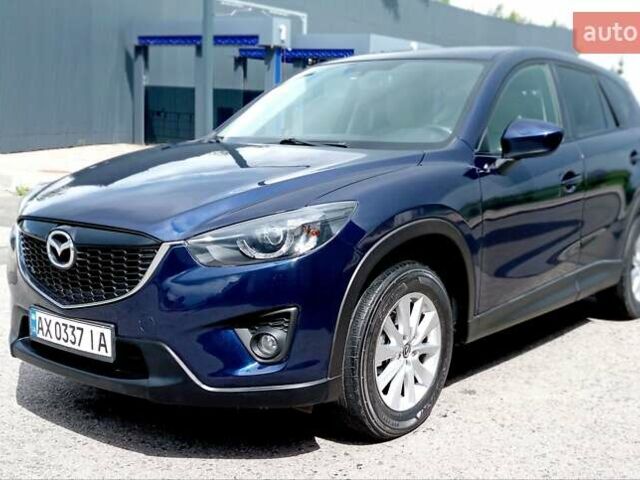 Синий Мазда СХ-5, объемом двигателя 2 л и пробегом 175 тыс. км за 11800 $, фото 1 на Automoto.ua