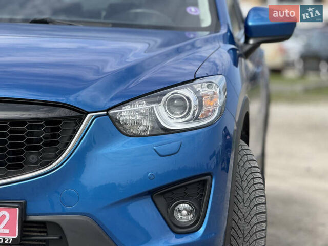 Синий Мазда СХ-5, объемом двигателя 2.2 л и пробегом 210 тыс. км за 12650 $, фото 4 на Automoto.ua