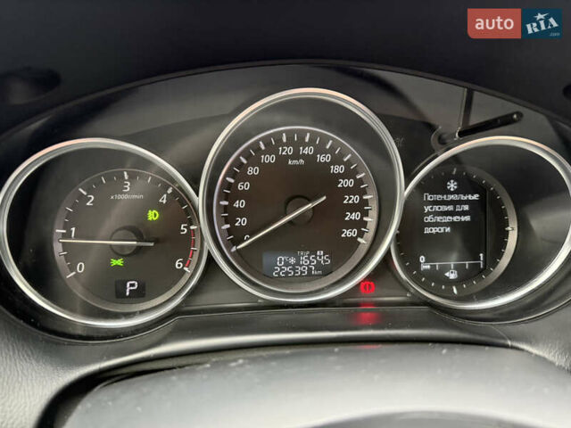 Синий Мазда СХ-5, объемом двигателя 2.19 л и пробегом 275 тыс. км за 12500 $, фото 36 на Automoto.ua