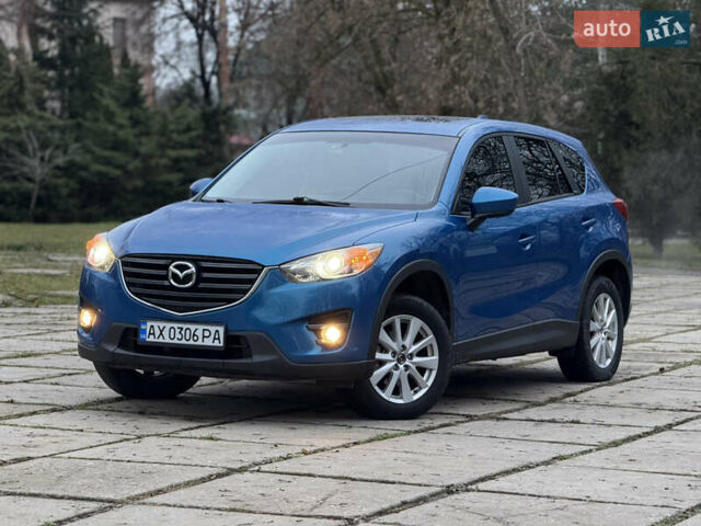 Синий Мазда СХ-5, объемом двигателя 2.5 л и пробегом 241 тыс. км за 12500 $, фото 4 на Automoto.ua