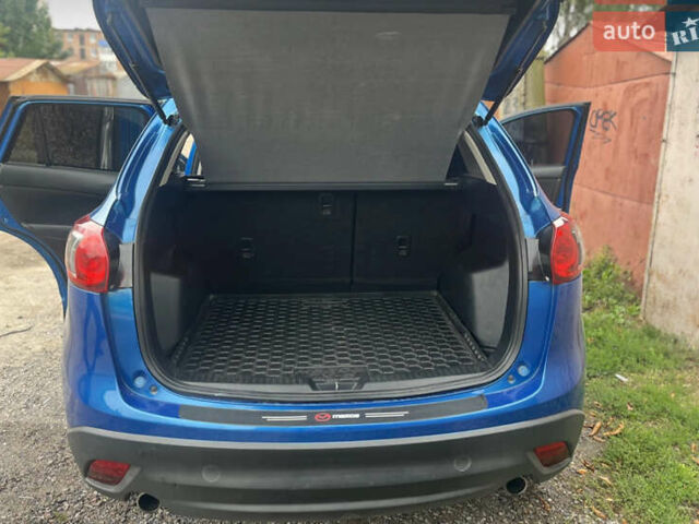 Синий Мазда СХ-5, объемом двигателя 2 л и пробегом 206 тыс. км за 12700 $, фото 5 на Automoto.ua