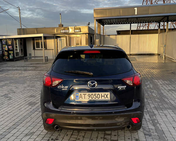 Синий Мазда СХ-5, объемом двигателя 2.19 л и пробегом 203 тыс. км за 11700 $, фото 5 на Automoto.ua