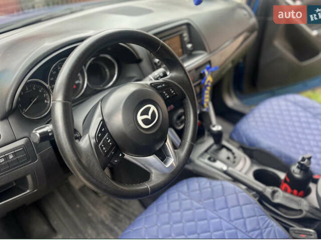 Синий Мазда СХ-5, объемом двигателя 2 л и пробегом 206 тыс. км за 12700 $, фото 6 на Automoto.ua