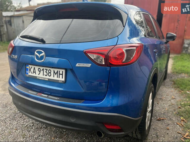 Синий Мазда СХ-5, объемом двигателя 2 л и пробегом 206 тыс. км за 12700 $, фото 3 на Automoto.ua