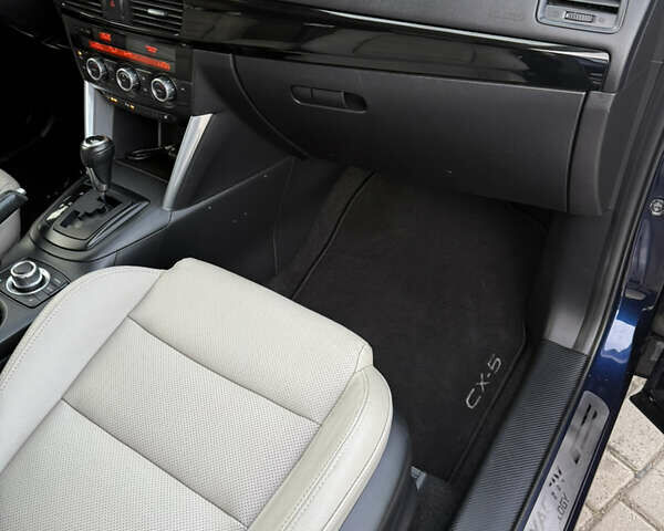 Синий Мазда СХ-5, объемом двигателя 2.2 л и пробегом 203 тыс. км за 12850 $, фото 38 на Automoto.ua