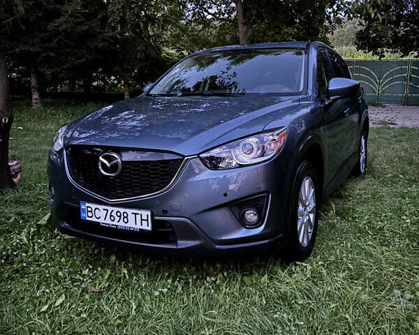 Синий Мазда СХ-5, объемом двигателя 2.49 л и пробегом 149 тыс. км за 12500 $, фото 3 на Automoto.ua