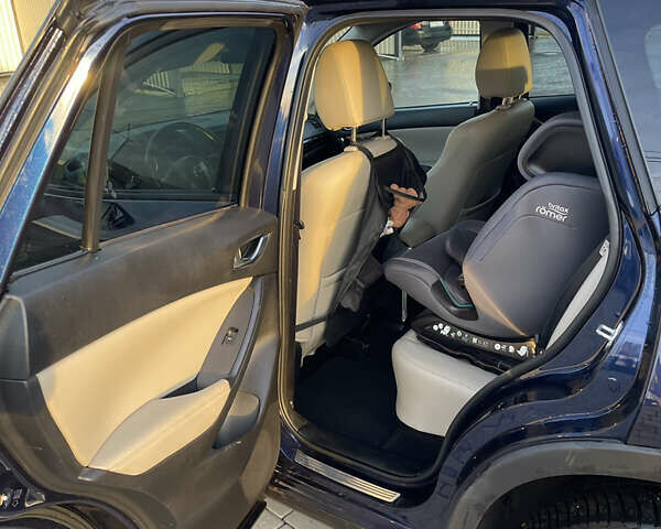 Синий Мазда СХ-5, объемом двигателя 2.19 л и пробегом 203 тыс. км за 11700 $, фото 12 на Automoto.ua