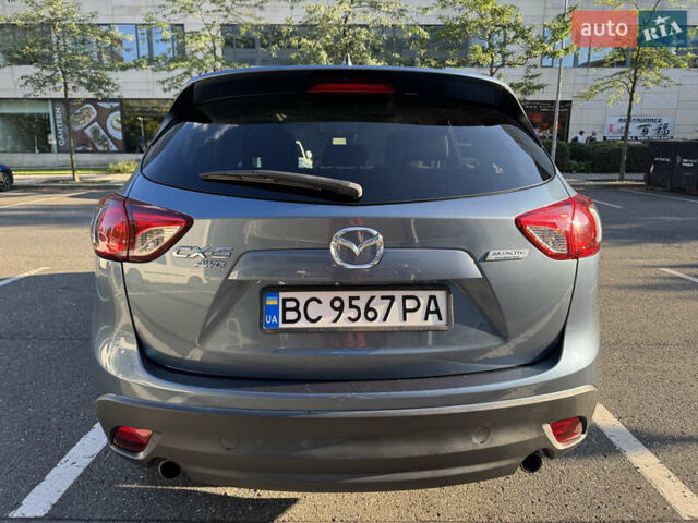 Синий Мазда СХ-5, объемом двигателя 2.5 л и пробегом 179 тыс. км за 14000 $, фото 6 на Automoto.ua