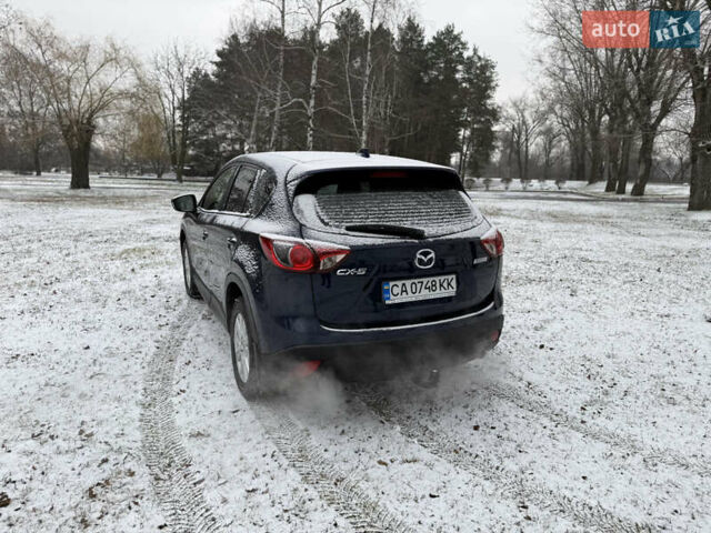 Синий Мазда СХ-5, объемом двигателя 2.19 л и пробегом 275 тыс. км за 12500 $, фото 59 на Automoto.ua