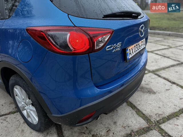 Синий Мазда СХ-5, объемом двигателя 2.5 л и пробегом 241 тыс. км за 12500 $, фото 6 на Automoto.ua