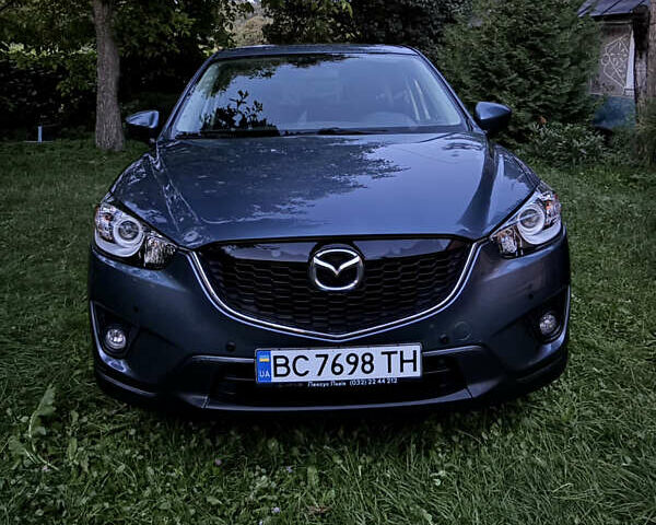 Синий Мазда СХ-5, объемом двигателя 2.49 л и пробегом 149 тыс. км за 12500 $, фото 2 на Automoto.ua
