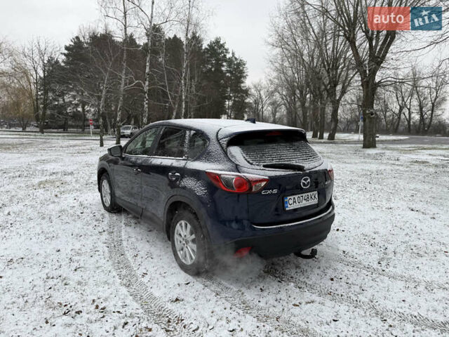 Синий Мазда СХ-5, объемом двигателя 2.19 л и пробегом 275 тыс. км за 12500 $, фото 60 на Automoto.ua