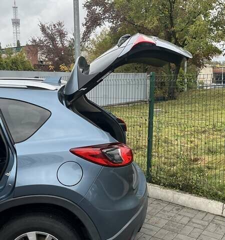 Синий Мазда СХ-5, объемом двигателя 2.5 л и пробегом 142 тыс. км за 13400 $, фото 25 на Automoto.ua