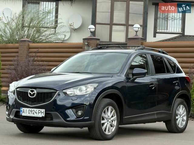 Синий Мазда СХ-5, объемом двигателя 2.19 л и пробегом 225 тыс. км за 14800 $, фото 6 на Automoto.ua