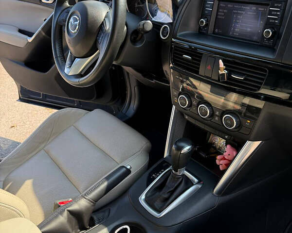 Синий Мазда СХ-5, объемом двигателя 2.5 л и пробегом 244 тыс. км за 16000 $, фото 5 на Automoto.ua