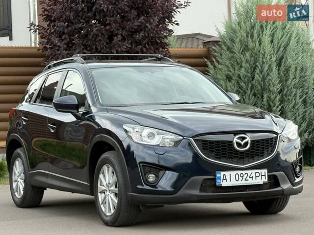 Синий Мазда СХ-5, объемом двигателя 2.19 л и пробегом 225 тыс. км за 14800 $, фото 13 на Automoto.ua