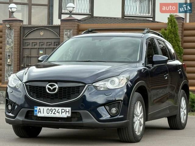 Синий Мазда СХ-5, объемом двигателя 2.19 л и пробегом 225 тыс. км за 14800 $, фото 2 на Automoto.ua