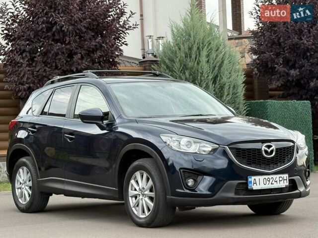 Синий Мазда СХ-5, объемом двигателя 2.19 л и пробегом 225 тыс. км за 14800 $, фото 16 на Automoto.ua