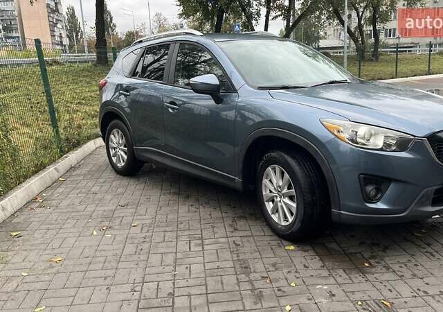 Синий Мазда СХ-5, объемом двигателя 2.5 л и пробегом 142 тыс. км за 13400 $, фото 10 на Automoto.ua