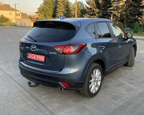 Синий Мазда СХ-5, объемом двигателя 2.2 л и пробегом 203 тыс. км за 14550 $, фото 2 на Automoto.ua