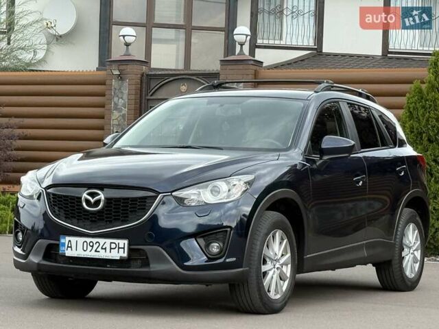 Синий Мазда СХ-5, объемом двигателя 2.19 л и пробегом 225 тыс. км за 14800 $, фото 4 на Automoto.ua