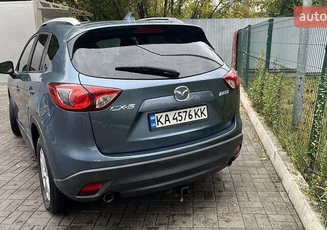 Синий Мазда СХ-5, объемом двигателя 2.5 л и пробегом 142 тыс. км за 13400 $, фото 9 на Automoto.ua
