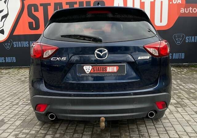 Синий Мазда СХ-5, объемом двигателя 2.2 л и пробегом 237 тыс. км за 12500 $, фото 5 на Automoto.ua