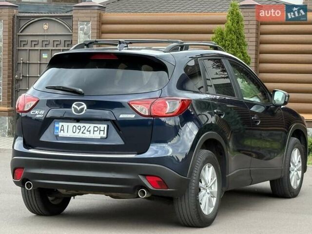 Синий Мазда СХ-5, объемом двигателя 2.19 л и пробегом 225 тыс. км за 14800 $, фото 34 на Automoto.ua