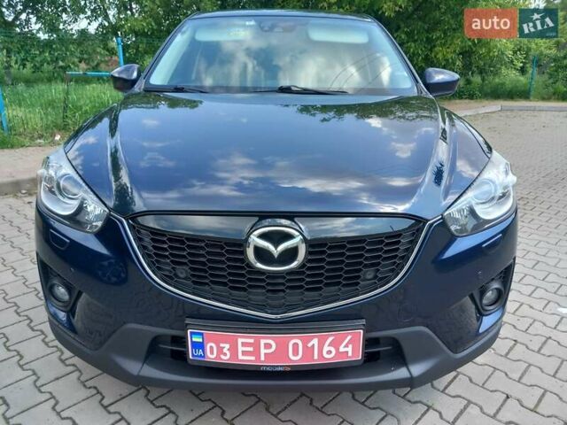 Синий Мазда СХ-5, объемом двигателя 2.2 л и пробегом 235 тыс. км за 15000 $, фото 1 на Automoto.ua