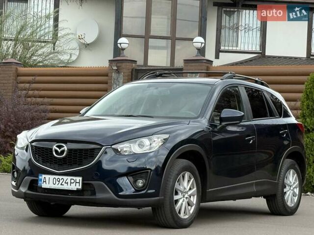 Синий Мазда СХ-5, объемом двигателя 2.19 л и пробегом 225 тыс. км за 14800 $, фото 5 на Automoto.ua