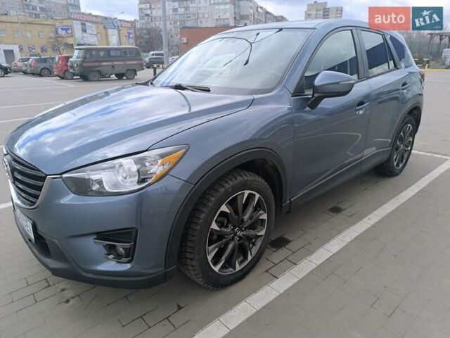 Синий Мазда СХ-5, объемом двигателя 2.49 л и пробегом 152 тыс. км за 15700 $, фото 3 на Automoto.ua