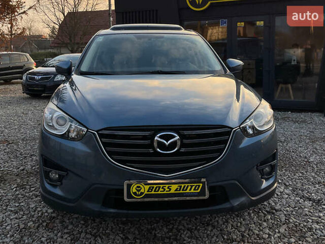 Синий Мазда СХ-5, объемом двигателя 2.49 л и пробегом 170 тыс. км за 16500 $, фото 1 на Automoto.ua