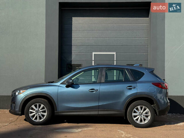 Синий Мазда СХ-5, объемом двигателя 2.49 л и пробегом 255 тыс. км за 13300 $, фото 1 на Automoto.ua