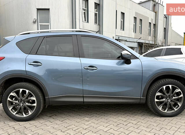 Синий Мазда СХ-5, объемом двигателя 2.49 л и пробегом 136 тыс. км за 13900 $, фото 5 на Automoto.ua