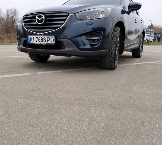 Синий Мазда СХ-5, объемом двигателя 2.5 л и пробегом 129 тыс. км за 16900 $, фото 1 на Automoto.ua