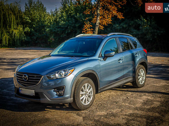 Синий Мазда СХ-5, объемом двигателя 2.5 л и пробегом 80 тыс. км за 16400 $, фото 2 на Automoto.ua