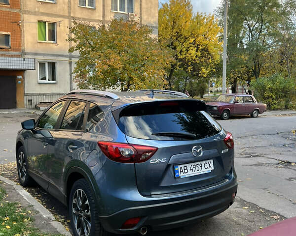 Синий Мазда СХ-5, объемом двигателя 2.49 л и пробегом 129 тыс. км за 14200 $, фото 4 на Automoto.ua