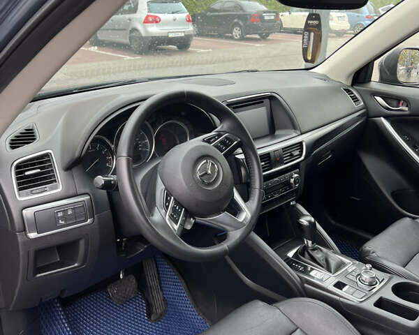 Синий Мазда СХ-5, объемом двигателя 2.49 л и пробегом 129 тыс. км за 14200 $, фото 3 на Automoto.ua