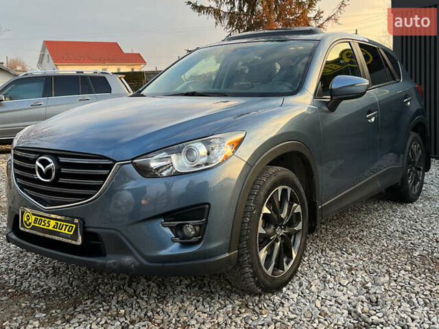 Синий Мазда СХ-5, объемом двигателя 2.49 л и пробегом 170 тыс. км за 16500 $, фото 2 на Automoto.ua