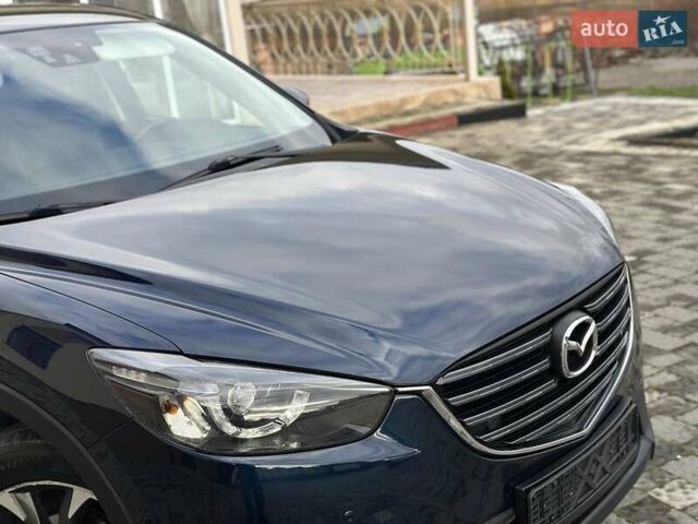 Синий Мазда СХ-5, объемом двигателя 2.19 л и пробегом 171 тыс. км за 16777 $, фото 37 на Automoto.ua