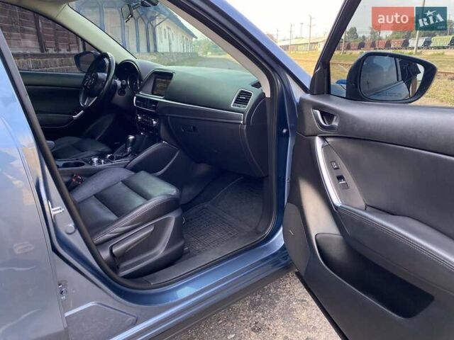 Мазда СХ-5 2015 в Бердичеве на Automoto.ua Синий Мазда СХ-5, объемом двигателя 2.49 л и пробегом 133 тыс. км за 14000 $, фото 21 на Automoto.ua